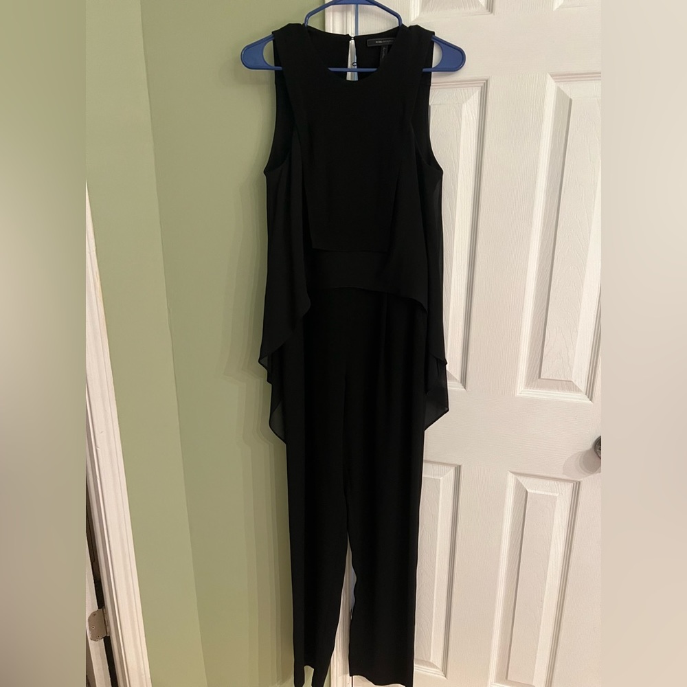 Open back jumpsuit. Very elegant.